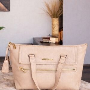 Michael Kors Beige Leather Handbag. With MK Lock And Key. Goldtone Hardware